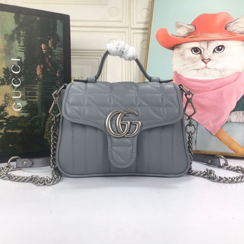 G*u*i top handle bags